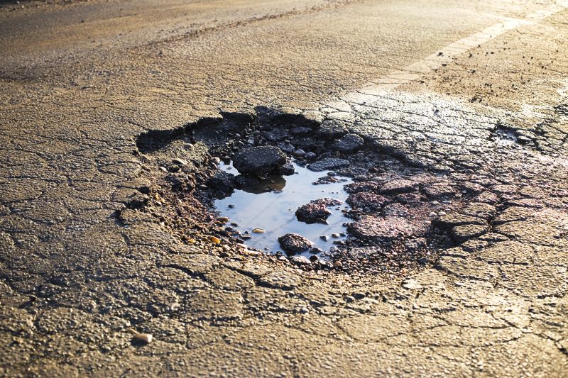 Cost of Pothole Repair — Cost of Pothole Repair