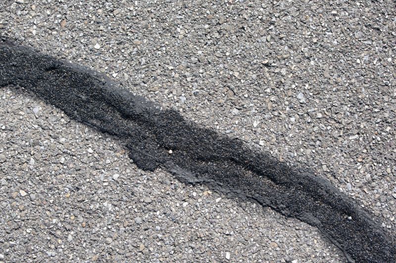 How Weather Conditions Affect Asphalt Cracks And Potholes